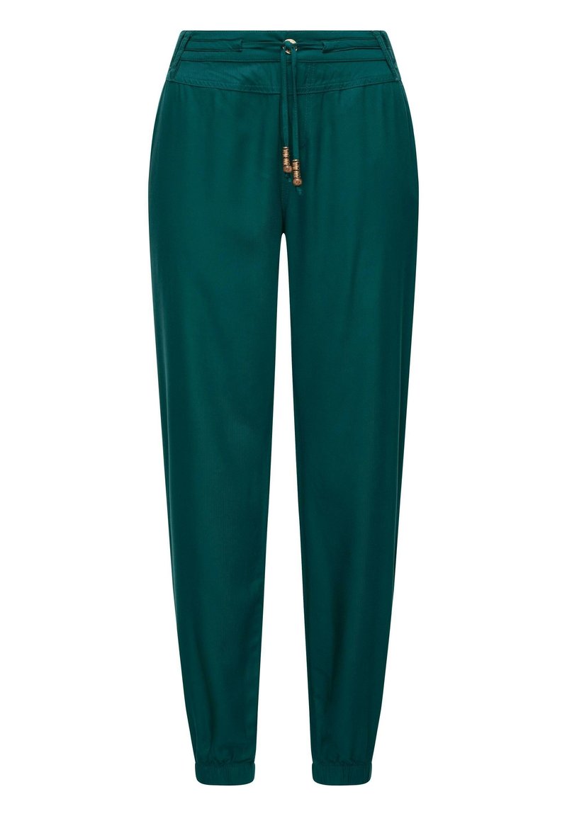 Teal joggerbyxor gjorda av ett mjukt tyg, med dragkedja i midjan, elastiska ärmslut och framfickor med sömmar.