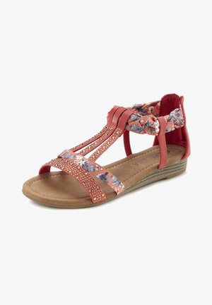 Sandalias de coral con acentos florales y tiras joya, con una suela plana y plantilla acolchada para mayor comodidad y soporte.