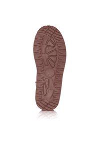 Suola di scarpa in gomma marrone con un motivo testurizzato che presenta forme circolari e triangolari per grip e trazione.