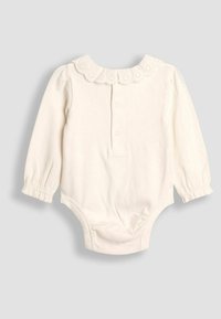 Langärmeliger cremefarbener Body mit einer mit Spitze verzierten Kragen, Knopfleiste vorne und elastischen Manschetten. Weicher Baumwollstoff, figurbetonte Form.
