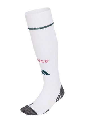 Witte kniekous voor sport met donkergrijze teen en hiel, een groene streep vlak bij de bovenkant en roze "MCF" tekst op de kuit.