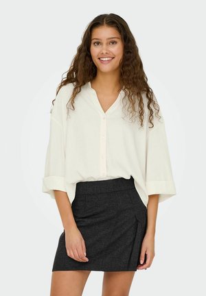 Blusa - cloud dancer