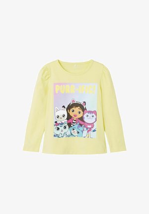 Żółta bawełniana koszula z długim rękawem z kolorową grafiką przedstawiającą postacie z kreskówek oraz napisem "PURR-IFIC!" z przodu.