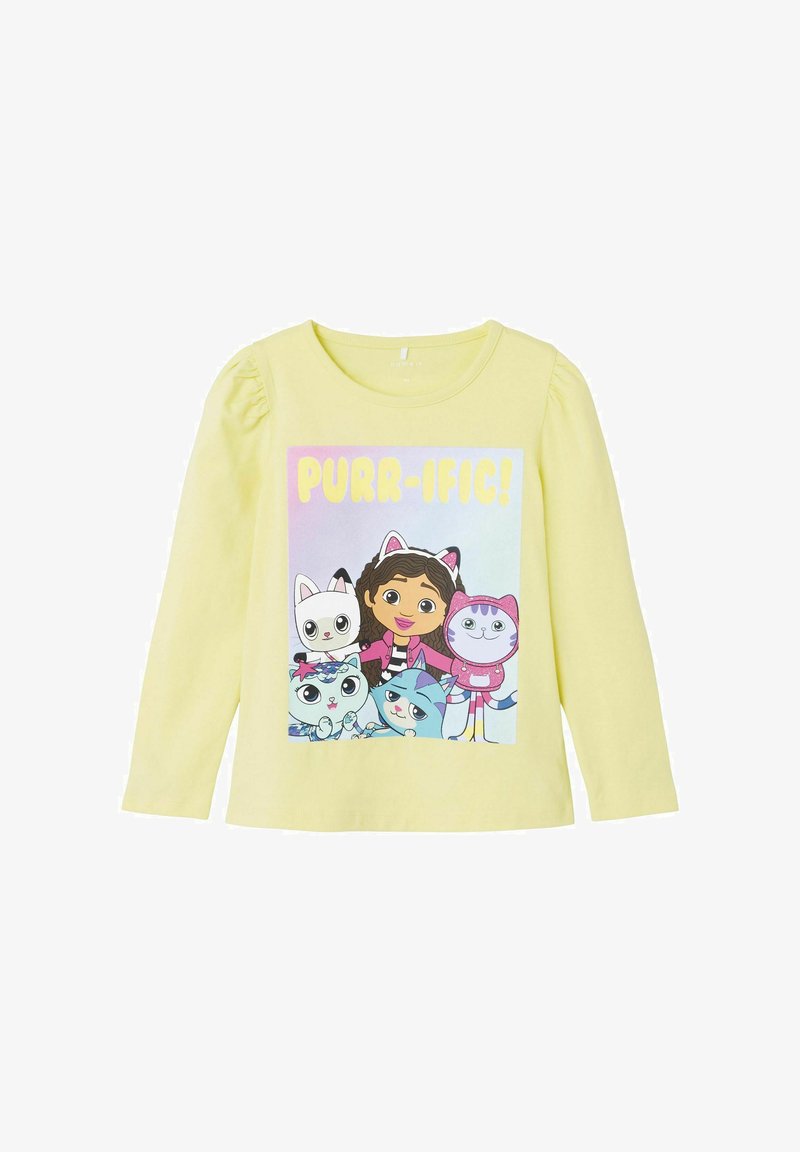 Langärmliges gelbes Baumwollhemd mit einem bunten Grafikdesign, das Cartoonfiguren und den Text "PURR-IFIC!" auf der Vorderseite zeigt.