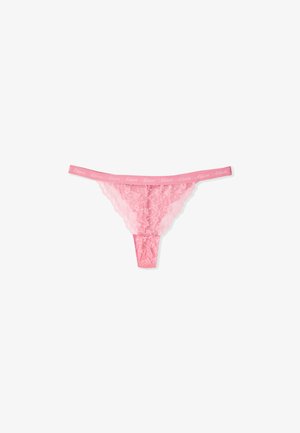 Pink lace thong underwear with thin waistband featuring repeated brand name "Etam" in white script, isolated on white background.