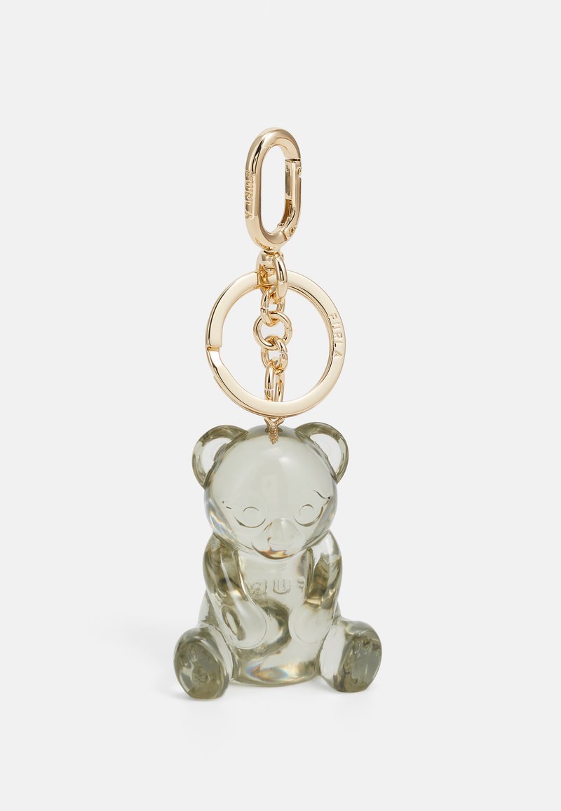 Pendente de chaveiro em vidro verde claro em forma de urso, com um laço e corrente de metal dourado. O urso apresenta orelhas arredondadas e detalhes em relevo na parte da frente.