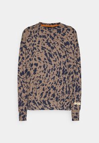 Sweat-shirt marron à manches longues avec des taches irrégulières bleu marine foncé un peu partout et un petit logo doré sur le bord de la manche gauche.