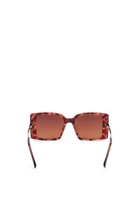 Ochelari de soare pătrați cu un model de broască țestoasă. Lentile maronii cu un gradient și accente metalice subțiri, elegante, pe balamale.