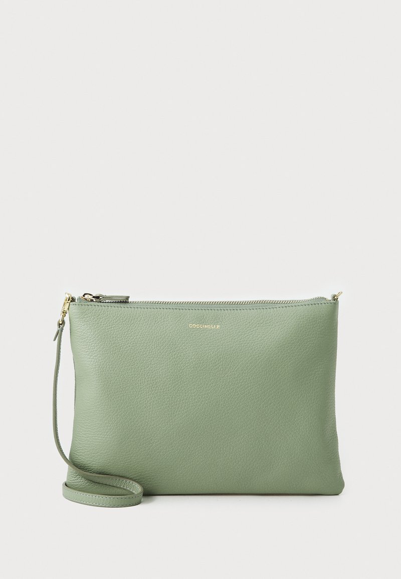 Green leather clutch bag with pebbled texture, golden hardware, and a detachable strap. Rectangular shape, zip closure at the top.