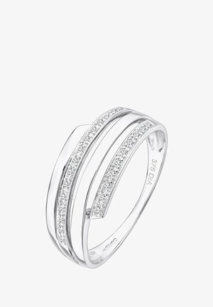 Srebrn prstan s tremi vzporednimi trakovi, od katerih eden vsebuje vrsto majhnih diamantov. Gladek videz, eleganten dizajn in poliran zaključek.