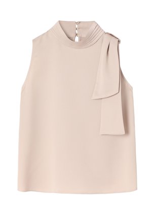 Haut sans manches beige avec col montant, détail plissé près de l'encolure et un long nœud noué à l'épaule droite.