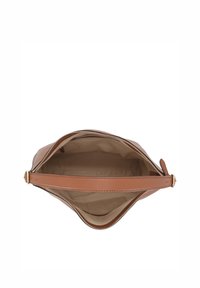 Tan leather handbag with a zip closure, showing a spacious beige interior. Features a single strap and simple, smooth design.