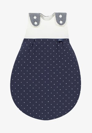 Navy sleep sack with white crescent moon and star pattern, cream top, striped shoulder straps, and button fastenings. Soft cotton material.
