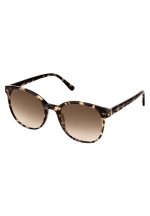 Lunettes de soleil écaille de tortue avec des verres ovales et une teinte brune dégradée. Présentent des montures épaisses et des branches fines avec un branding subtil.