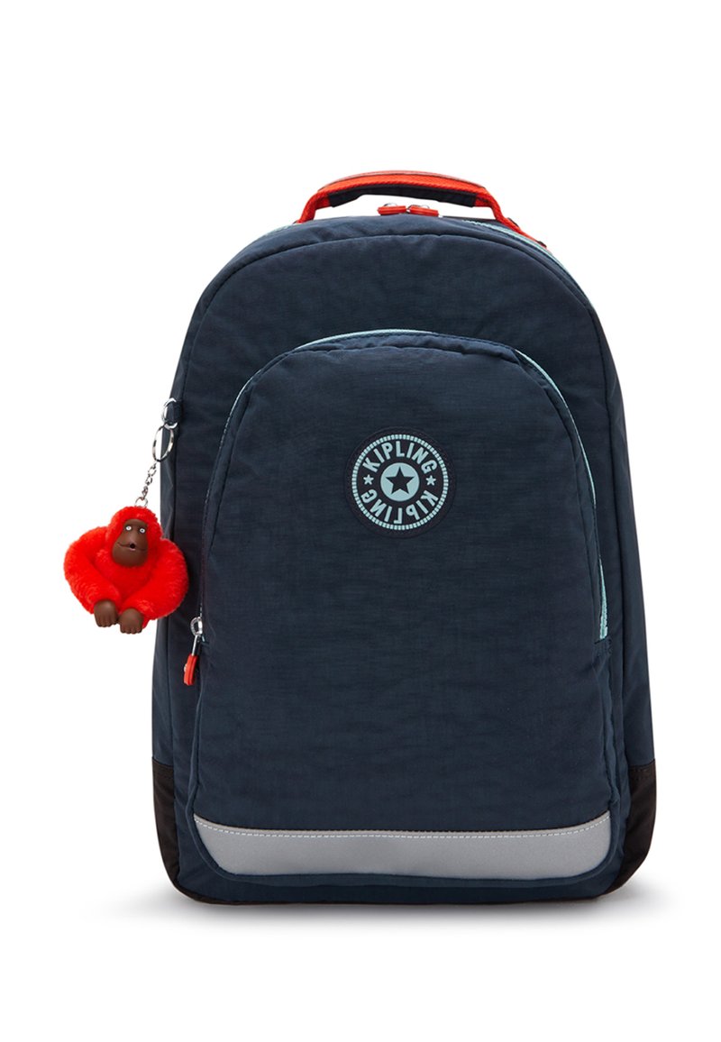 Navy blue backpack with a textured surface, featuring a round Kipling logo, gray trim, and a red monkey keychain attached.