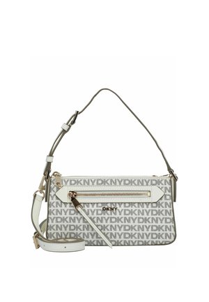 White and gray DKNY monogram crossbody bag with gold zipper, adjustable strap, and logo plaque on front pocket.