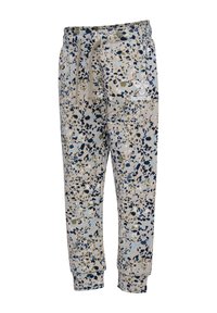 Sweatpants i beige med blå, grön och svart abstrakt mönster; elastisk midja med snöre; ribbad manschett; märkeslogotyp på framsidan.