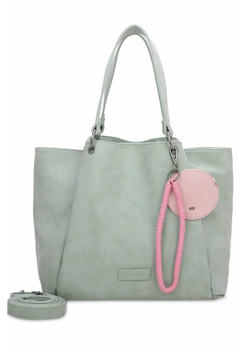 Sac fourre-tout en simili cuir vert clair avec poignées doubles, équipé d'un porte-clés circulaire rose et d'une bandoulière amovible. Texture lisse, design épuré.