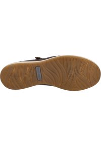 Brown shoe sole with a textured rubber surface. Features a wave pattern and a silver logo plate indicating "JOSEF SIEBEL." Flat profile.