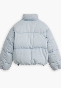 Light blue puffer jacket with a high collar, quilted design, and elasticated hem. Features rounded sleeves and a soft texture.