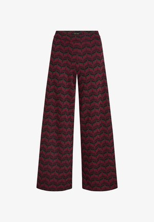 Pantalones de pierna ancha en tela burdeos con un patrón en zigzag en verde y negro. Cintura elástica para mayor comodidad. Textura sutil.