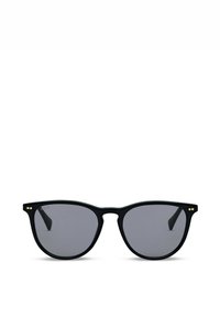 Zwarte zonnebril met ronde montuur, donker getinte glazen en kleine gouden stippen nabij de scharnieren, weergegeven op een witte achtergrond.