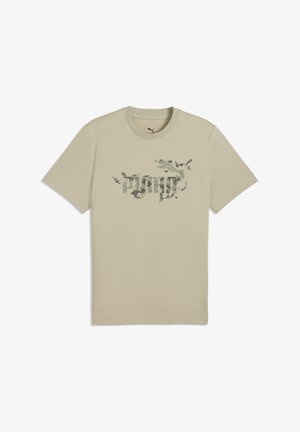 Beige cotton T-shirt featuring a camouflage graphic print in green and black, with a crew neck and short sleeves.