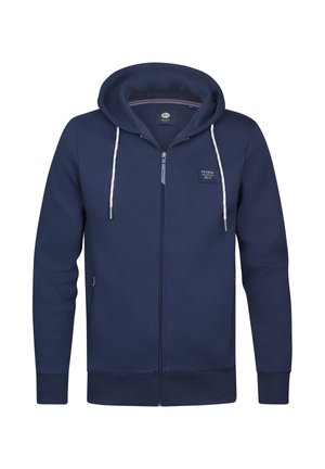 Sudadera con capucha y cremallera en color azul marino, confeccionada con un tejido suave. Cuenta con capucha ajustable con cordón, bolsillos laterales y un pequeño parche con la marca en el pecho. Textura lisa.