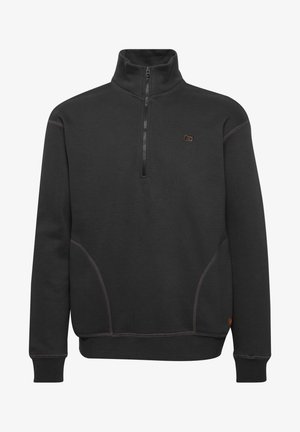 Tumši pelēks sporta krekls ar augstu apkakli un pusslīdošu rāvējslēdzēju. Iespējas kontrastējošā šuve un smalks logo uz krūšu daļas. Ērta auduma.