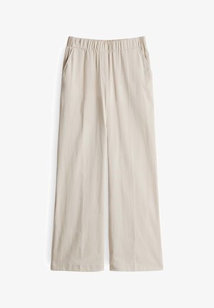 Lichtbeige wijde pijpen broek met een elastische tailleband. Bevat twee zijzakken en een gladde, textuurrijke stof.