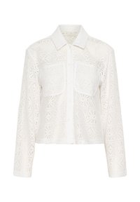 Chemise blanche à manches longues avec tissu en dentelle crochet et deux poches poitrine, dotée d'un col classique et d'une coupe légèrement courte.