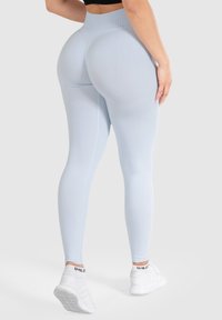 Smilodox SLAYTON SCRUNCH EFFECT LEGGINGS SPORT FITNESS - Leggings - hellblau