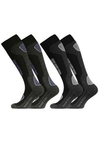 Quatre paires de chaussettes montantes, composées d'un mélange de matériaux noirs, gris et gris foncé, avec des accents texturés et des motifs.