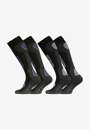 Four pairs of knee-high socks, featuring a blend of black, gray, and dark gray materials, with patterned accents and textured detailing.