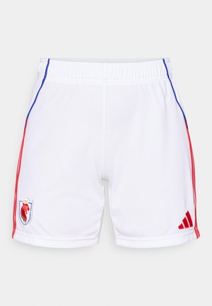 Shorts de sport blancs avec des rayures latérales rouges et bleues, taille élastique, avec un écusson logo sur la cuisse gauche et un branding adidas sur la droite.