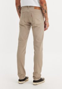 Levi's® 511 SLIM - Jeans straight leg - paper