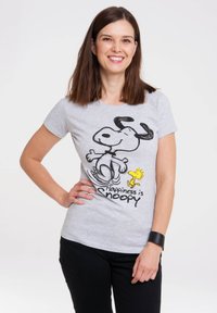 Gray cotton t-shirt featuring a black cartoon of Snoopy and a yellow Woodstock, with the text "Happiness is Snoopy" underneath.