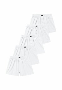 Five pairs of plain white men's cotton boxer shorts with elastic waistbands and front button fly, stacked diagonally on a white background.
