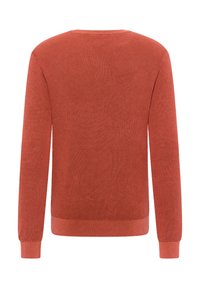 Roter gestrickter Pullover mit rundem Ausschnitt, langenÄrmeln und gerippten Bündchen. Die texturierte Stoff sensibilisiert das einfarbige Design.