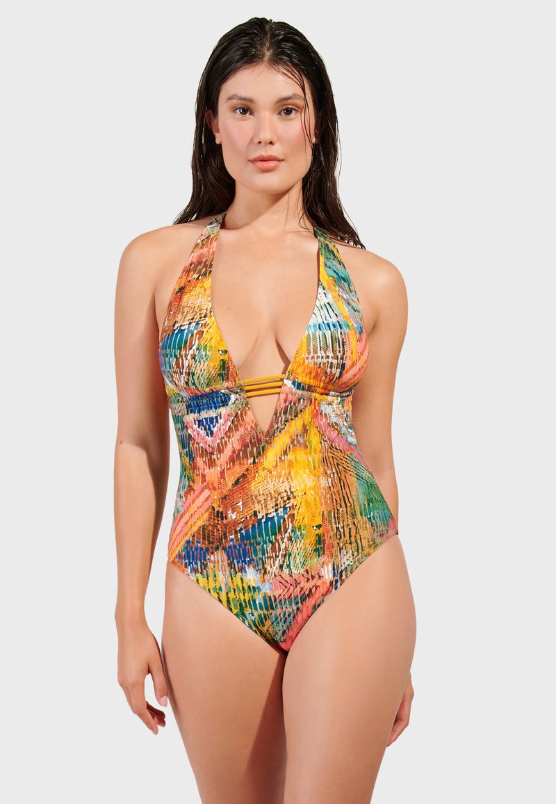Färgglad halterneck baddräkt med djup V-ringning, djärva abstrakta mönster i orange, blått, grönt och gult, med texturerad tyg.