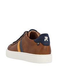 Brown leather sneaker with navy accents, featuring orange and navy stripes on the side, black laces, and a white rubber sole.