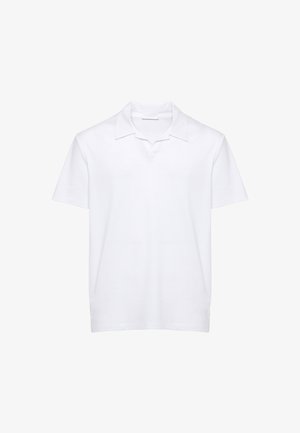 Polo bianca a maniche corte con colletto rilassato e senza bottoni visibili, mostrata su uno sfondo bianco semplice.