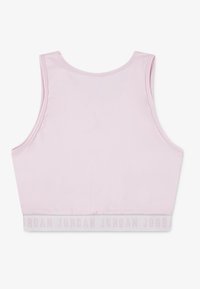 Hellrosa sportliches Crop-Top mit glatter, elastischer Textur. Verfügt über einen breiten, gebrandeten Taillenbund mit „JORDAN“ in Hellgrau.