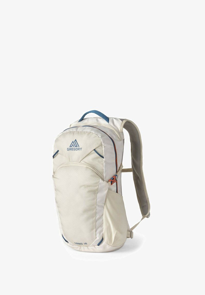 Lightweight cream backpack with blue accents, zippered compartments, textured fabric, and padded straps for comfort. Suitable for outdoor use.