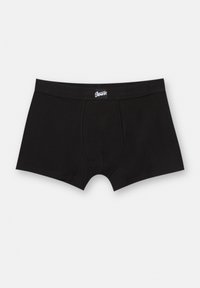 Čierne boxerky vyrobené z mäkkej tkaniny, s tesným strihom a elastickým pásom s logom. Hladký povrch s minimálnymi švami.