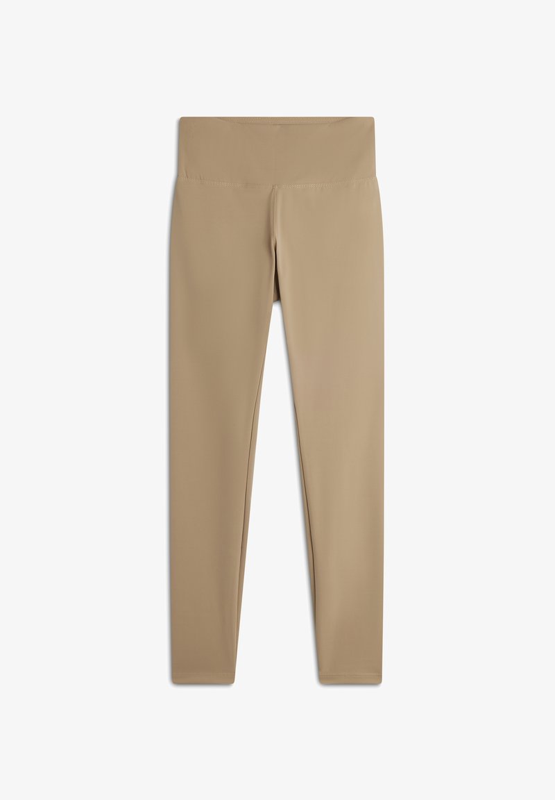 Leggings beige realizzati in tessuto elasticizzato e liscio. Design con vita alta e senza cuciture visibili, modellati per una vestibilità aderente.