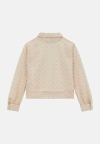 Giacca cropped beige chiaro con maniche lunghe, motivo tono su tono sottile, colletto classico e polsini elastici. Tessuto liscio, stoffa trasparente.