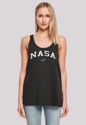 Black tank top made of cotton with wide armholes. Features large white "NASA" text and logo on the front. Soft texture and relaxed fit.