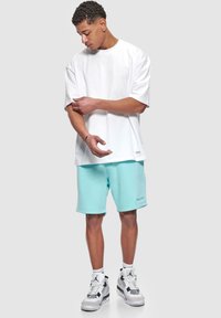 Dropsize HEAVY - Pantaloni sportivi - tiffany blue