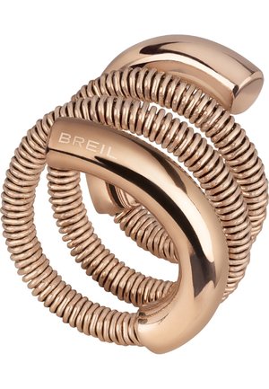 Bracelet enroulé en or rose avec des segments lisses et courbés, dont un gravé du logo "BREIL", présentant un design flexible et élastique.